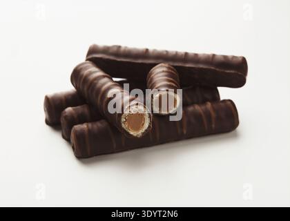Small chocolate candies isolated on white Stock Photo