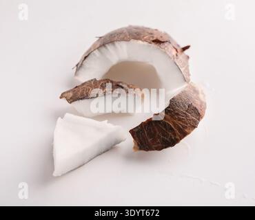 Coconut pieces isolated on a white background Stock Photo