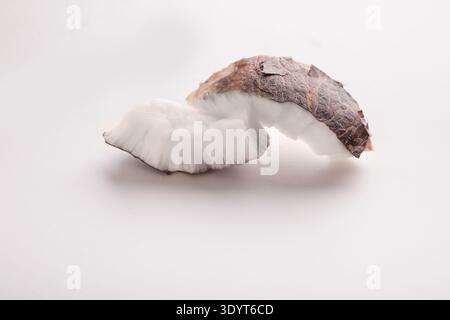 Coconut pieces isolated on a white background Stock Photo