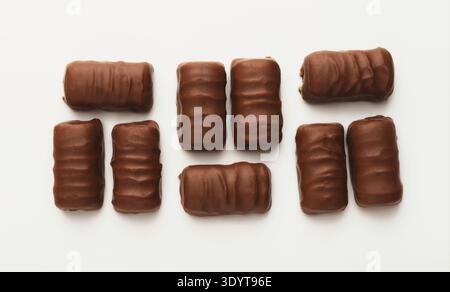 Small chocolate candies isolated on white Stock Photo