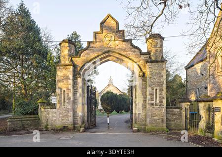 The main entrance gate to Southampton Old Cemetery with the Anglican chapel beyond. Southampton, UK Stock Photo
