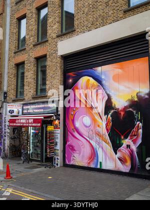 Mr Cenz, Graffiti Artist, Artwork on Brick Lane hotel, Hub by Premier Inn London Spitalfields, London, England, UK, GB. Stock Photo