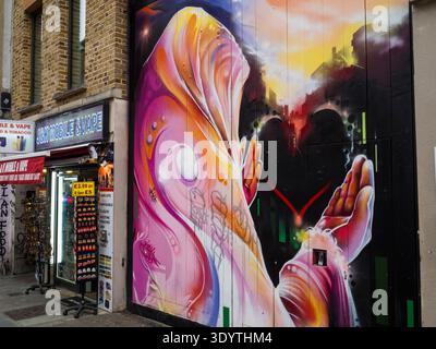 Mr Cenz, Graffiti Artist, Artwork on Brick Lane hotel, Hub by Premier Inn London Spitalfields, London, England, UK, GB. Stock Photo