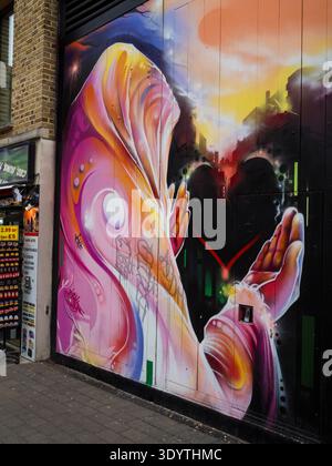 Mr Cenz, Graffiti Artist, Artwork on Brick Lane hotel, Hub by Premier Inn London Spitalfields, London, England, UK, GB. Stock Photo