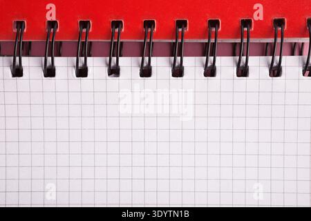Closeup of notepad springs and paper, copy space for text Stock Photo