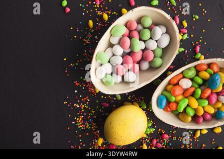 Chocolate eggs and colorful candies Stock Photo