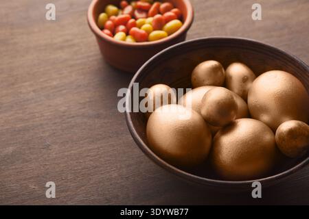 Background with golden decorated easter eggs Stock Photo