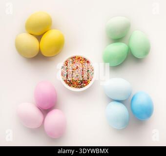 Easter background. Colored eggs on white, isolated Stock Photo