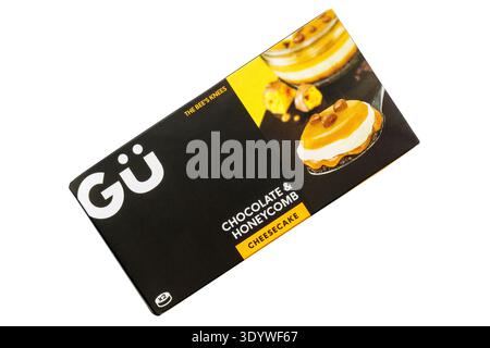 Gü GU Chocolate & Honeycomb Cheesecake topped with honeycomb chunks puddings isolated on white background Stock Photo