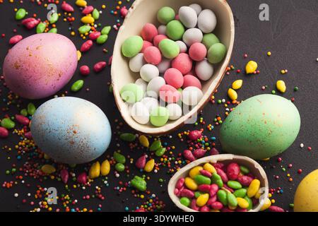 Chocolate egg and colorful candies Stock Photo