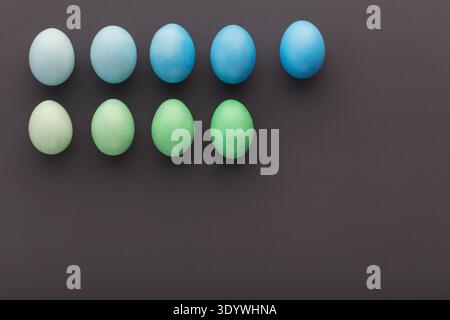 Easter background. Colored eggs on gray background Stock Photo