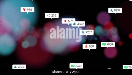 Displaying speech-bubble notification icons floating over black backdrop, with teal magenta bokeh Stock Photo