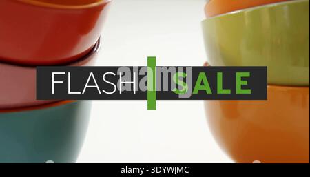 Displaying FLASH SALE banner with green bar on white table, bowls stacked red or teal and green or o Stock Photo