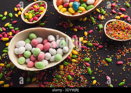 Chocolate eggs filled with sweets Stock Photo
