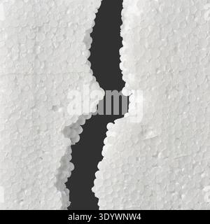 broken white styrofoam piece isolated black background, compressed spherical polystyrene beads with vertical jagged crack Stock Photo