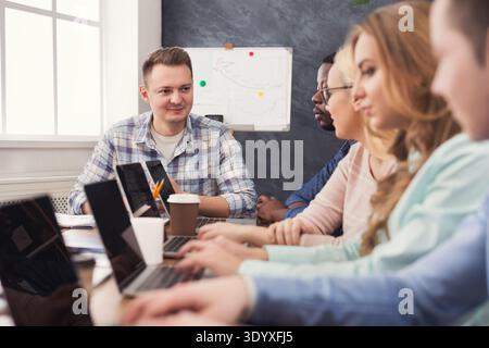 Programmers working in software developing company Stock Photo