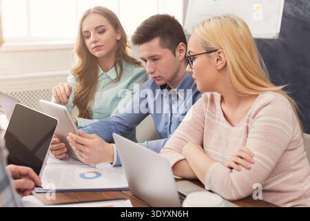 Programmers working in software developing company Stock Photo