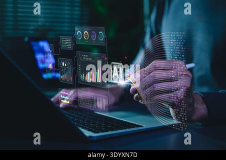 Artificial intelligence data analytics concept. Professional using laptop with dashboard, machine learning charts, real time data processing Stock Photo