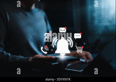 Digital notification concept. Person holding smartphone with floating icons for email, call, calendar, message, and shopping. Stock Photo