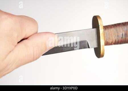 Various details of grip for throwing weapons - detail of hand and fingers Stock Photo