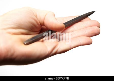 Styles of grip for single blade shuriken throwing weapons - detail of hand grip Stock Photo