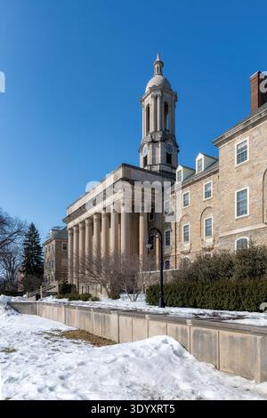 The Old Main building on the campus of Penn State University in winter day, State College, Pennsylvania. Stock Photo