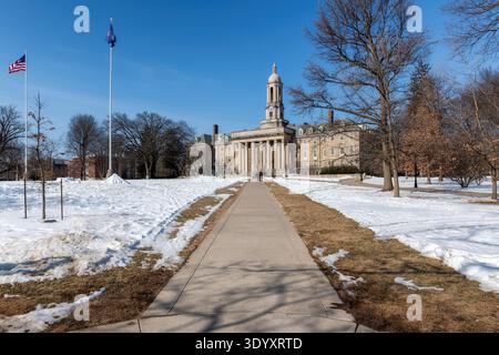 The Old Main building on the campus of Penn State University in winter day, State College, Pennsylvania. Stock Photo