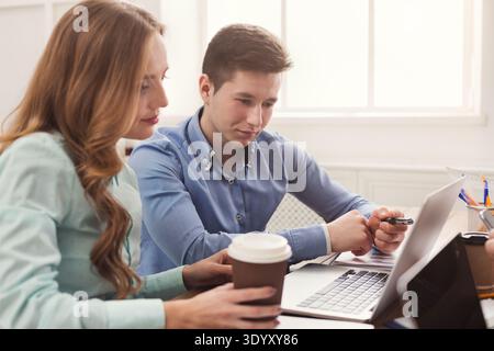 Programmers working in software developing company Stock Photo