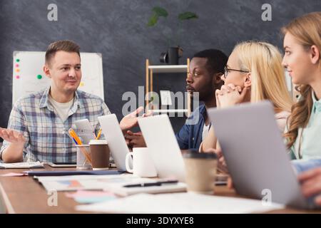 Programmers working in software developing company Stock Photo
