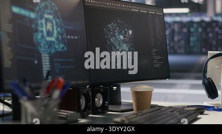 Server hub PC screens tracking rackmounts processing large scale machine learning datasets for artificial intelligence operations. Computer displays monitoring gear used in AI model development Stock Photo