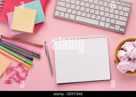 Spiral notepad on pink background, top view Stock Photo