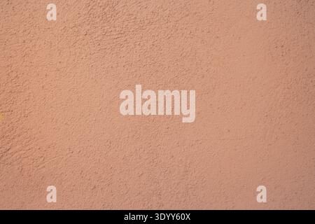 Rough terracotta wall texture, earthy abstract background Stock Photo