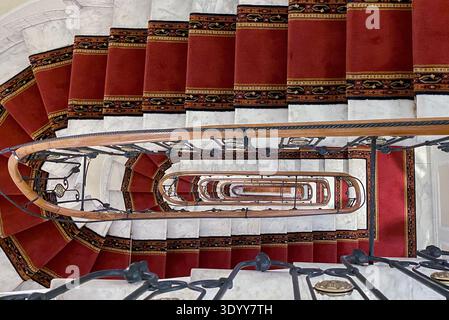 Downward view of marble staircase in luxury hotel Stock Photo