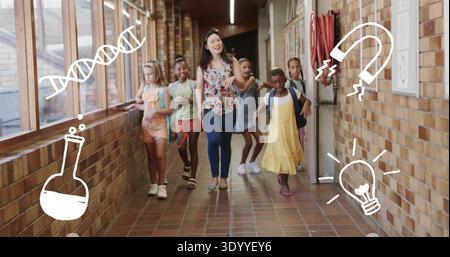 Walking teacher in floral blouse and jeans leading six students down corridor, windows, backpacks Stock Photo