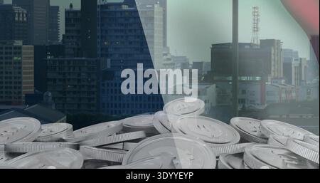 Displaying pile of silver coins on rooftop, split by glass panel, skyline antenna, mesh, red arc Stock Photo