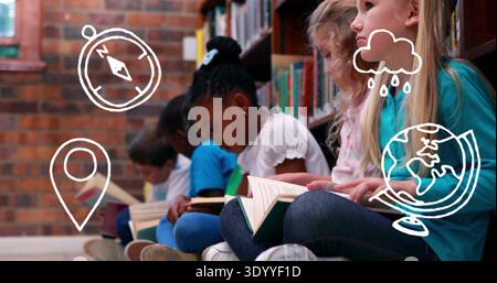 Diverse children sitting in library reading corner holding open books by brick wall, copy space Stock Photo