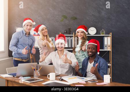 People work in office in xmas, celebrating success Stock Photo