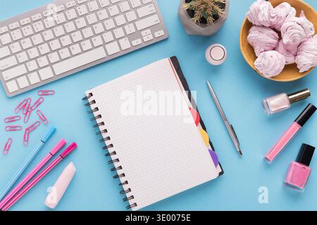 Spiral notepad on blue background, top view Stock Photo