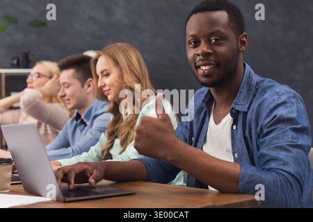 Programmers working in software developing company Stock Photo