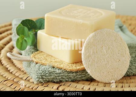 Natural Marseille bar soaps with loofah sponges - Concept of beauty and natural skincare products Stock Photo