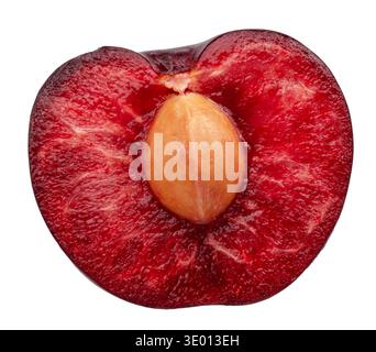 Half of red sweet cherry with stone isolated on white background. File contains clipping path. Stock Photo