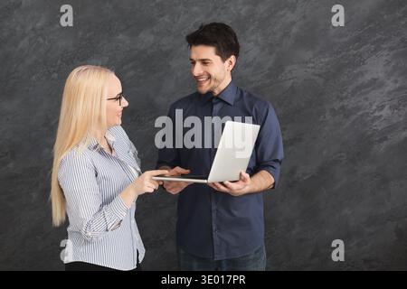 Couple shopping online with digital tablet Stock Photo