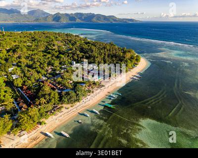 Aerial view of a beautiful tropical island resort with white sand beach and clear blue sea Stock Photo