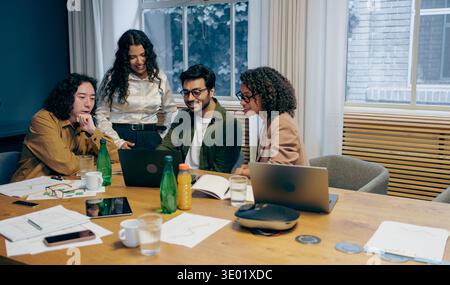 Team Meeting For Product Development, Workshop Involving Prototyping And Strategic Discussions Stock Photo