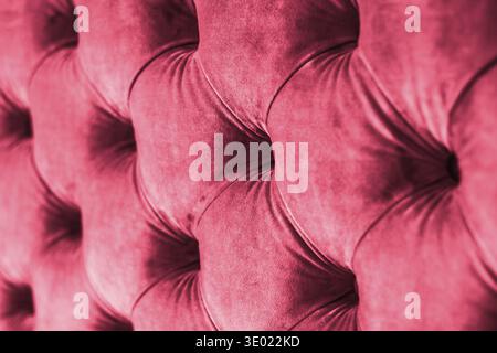Furniture design, classic interior and royal vintage material concept - Pink luxury velour quilted sofa upholstery with buttons, elegant home decor te Stock Photo