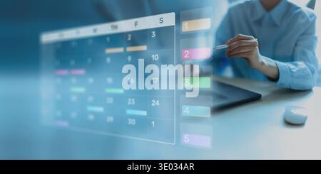 Project Management and Schedule Planning Displayed on a Digital Calendar Interface. Stock Photo