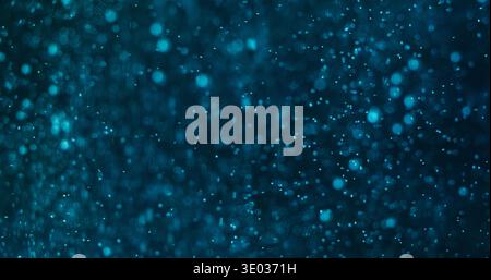 Bokeh circles luminosity particles fly blue glow Stock Photo