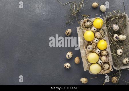Easter holiday greeting card background with yellow eggs Stock Photo