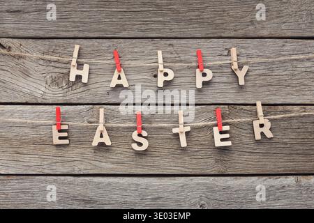 Easter greetings hanging on the rope Stock Photo