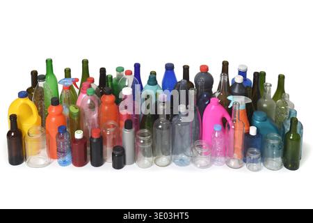 elevated view of set of bottles, glass and plastic containers that are used and are for recycling on white background Stock Photo